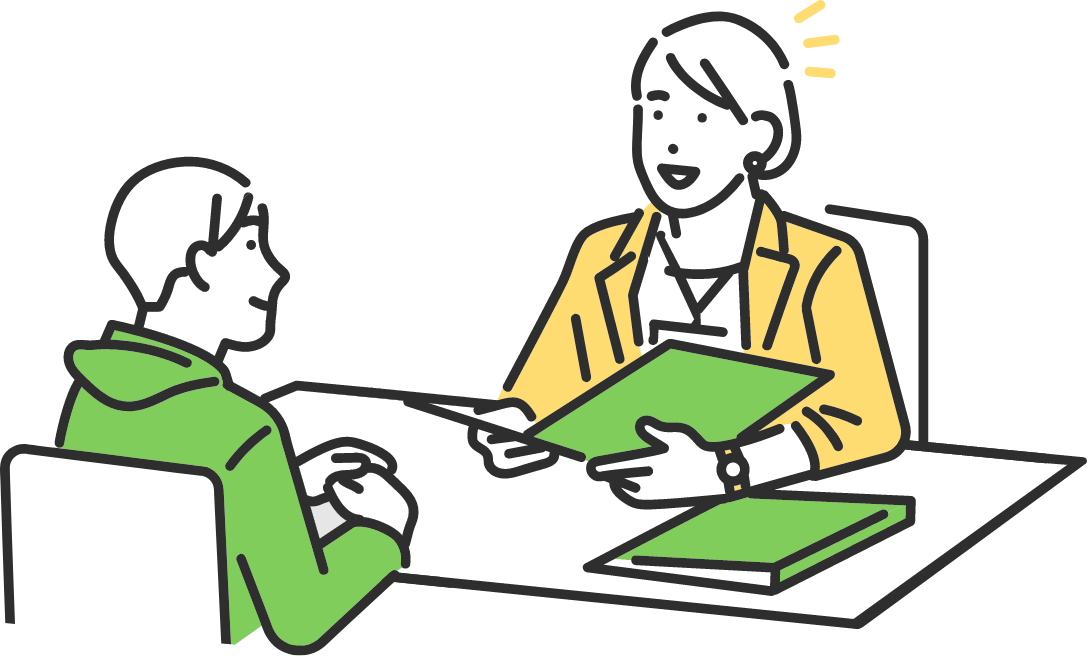 資料を見ながら話し合う男女